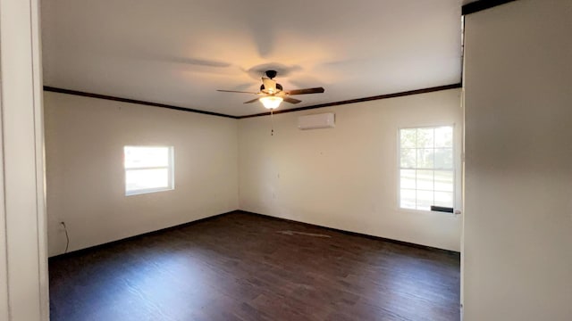 empty room with ceiling fan, dark hardwood / wood-style flooring, crown molding, and a wall mounted air conditioner