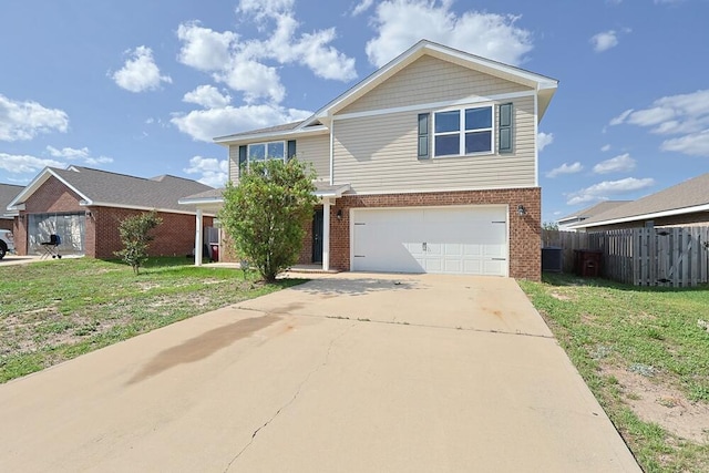 820 Moorhen Way, Crestview, FL 32539 - traditional-style home with brick siding, an attached garage, and concrete driveway