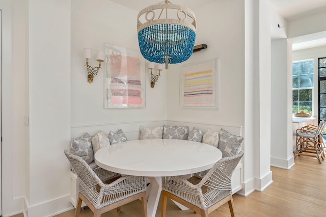 dining room featuring light hardwood / wood-style floors and breakfast area