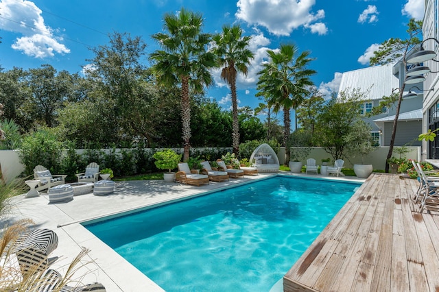 view of pool featuring a patio area