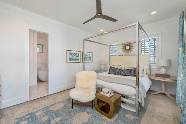 bedroom with ensuite bath, ceiling fan, and crown molding