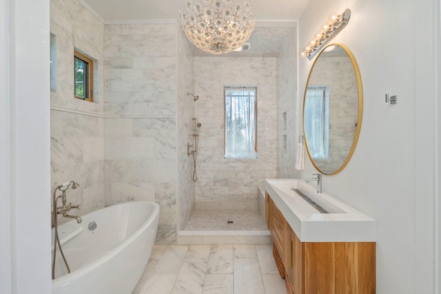 bathroom with shower with separate bathtub, vanity, a healthy amount of sunlight, and a notable chandelier