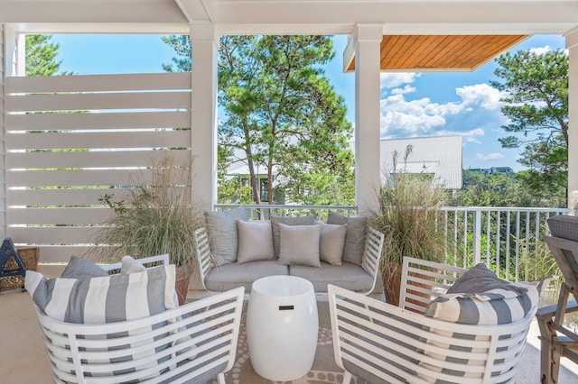 view of patio / terrace with a balcony