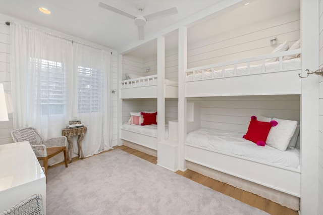 bedroom featuring ceiling fan and hardwood / wood-style floors