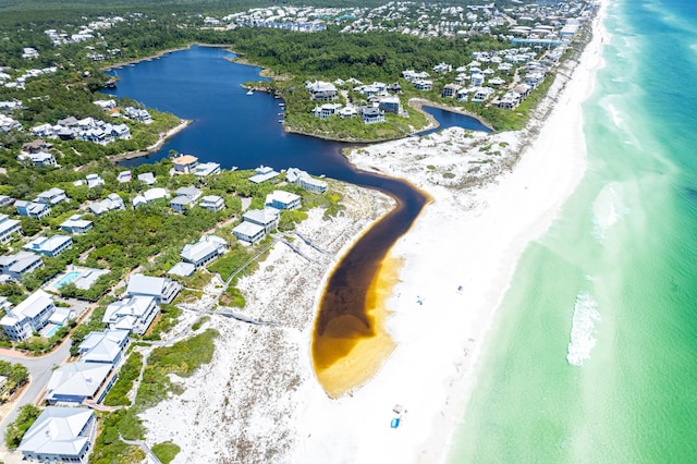 drone / aerial view with a view of the beach and a water view