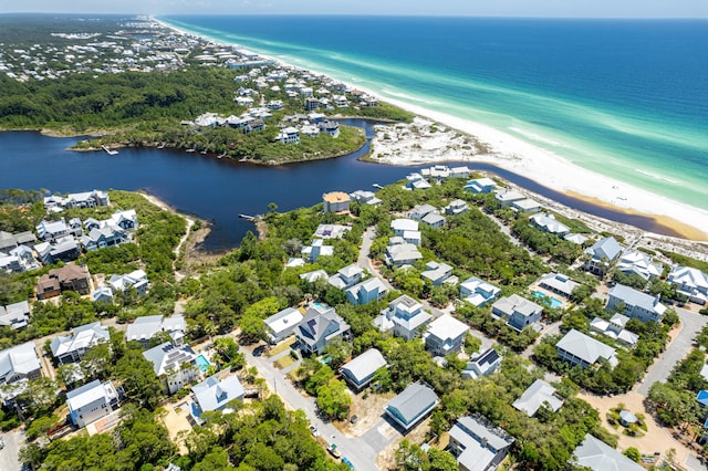 bird's eye view with a beach view and a water view