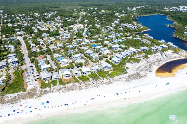 bird's eye view featuring a beach view and a water view