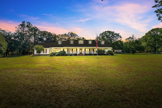 view of front of house featuring a lawn