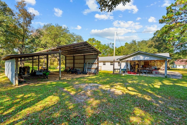 exterior space with a yard and a carport