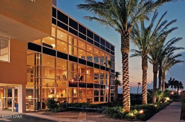 view of outdoor building at dusk