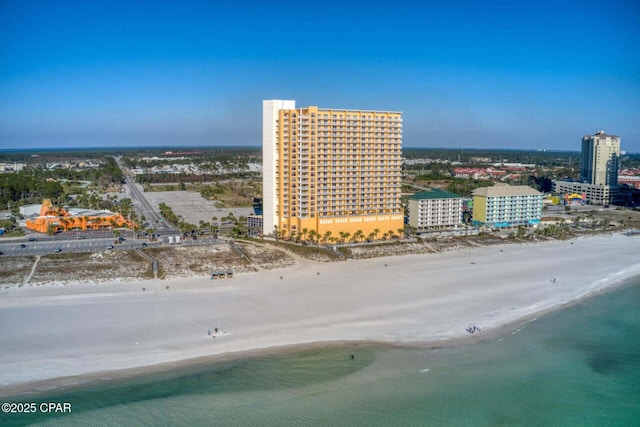 aerial view with a beach view and a water view