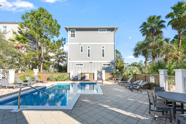 view of pool featuring a patio