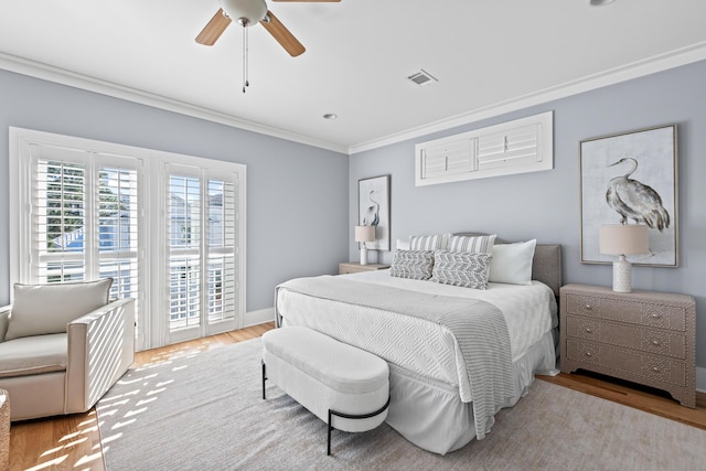 bedroom featuring access to exterior, ceiling fan, crown molding, and light hardwood / wood-style flooring