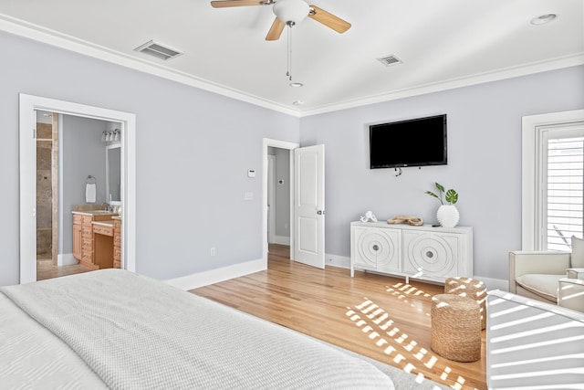 bedroom featuring ceiling fan, connected bathroom, ornamental molding, and hardwood / wood-style flooring