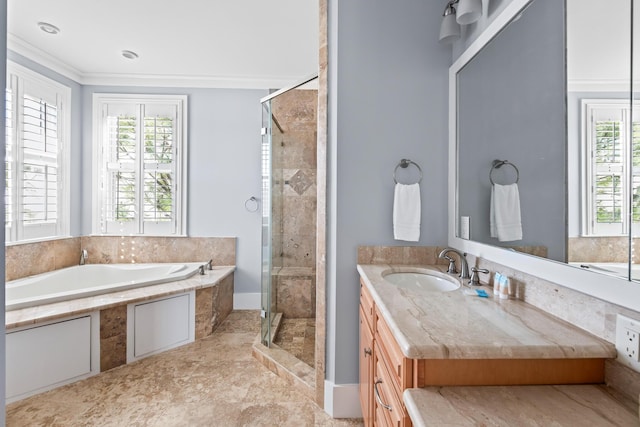 bathroom with crown molding, independent shower and bath, and vanity