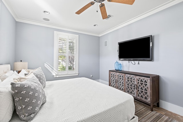 bedroom featuring ornamental molding, ceiling fan, and tile patterned floors