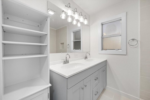 bathroom featuring tile patterned floors and vanity