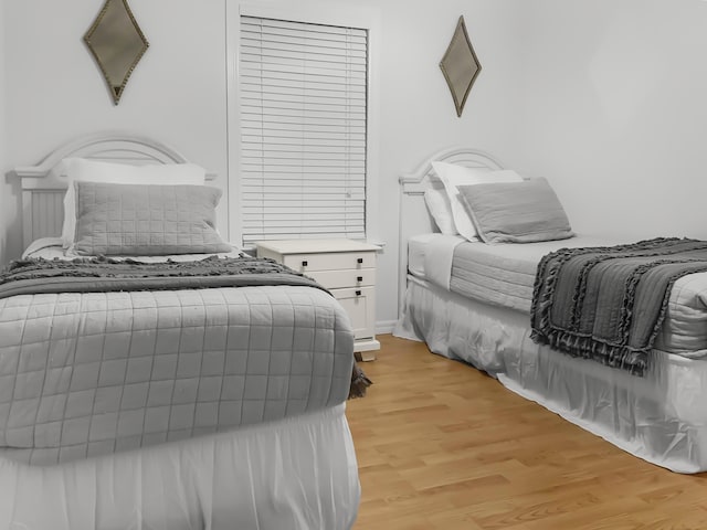 bedroom featuring light wood-type flooring