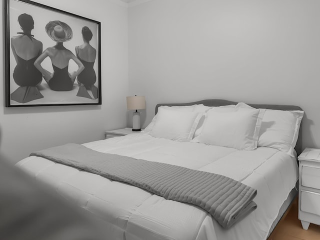 bedroom featuring crown molding