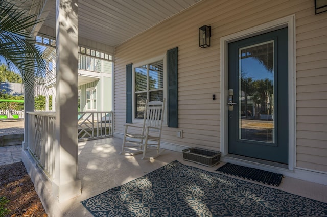 property entrance with a porch