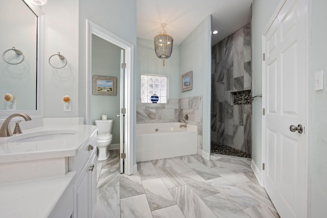 full bathroom with vanity, shower with separate bathtub, toilet, and an inviting chandelier