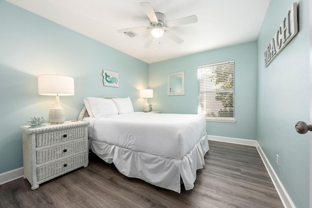 bedroom featuring dark wood-type flooring and ceiling fan