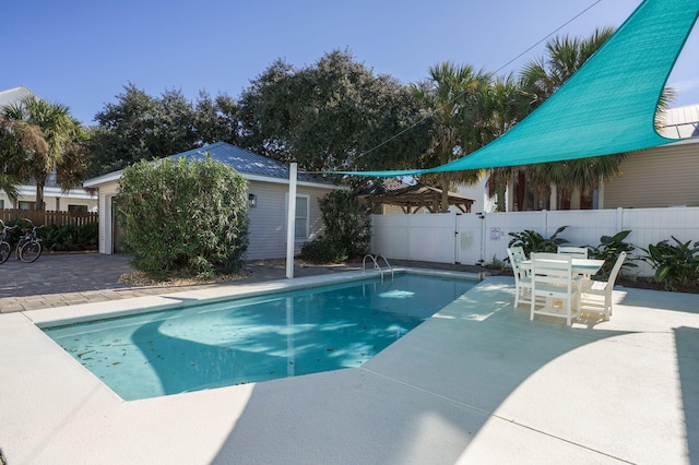 view of pool featuring a patio area