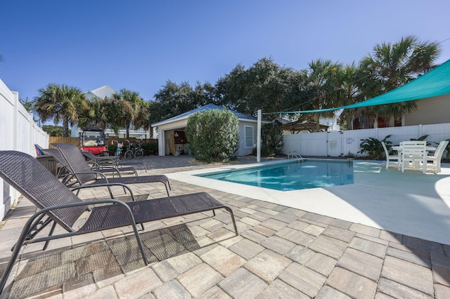 view of pool featuring a patio area