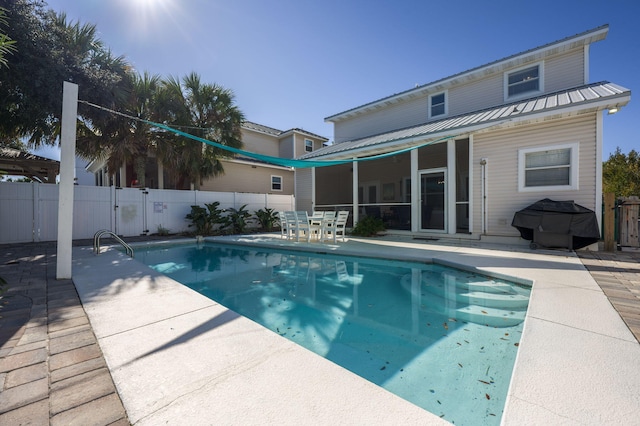 view of swimming pool with a patio