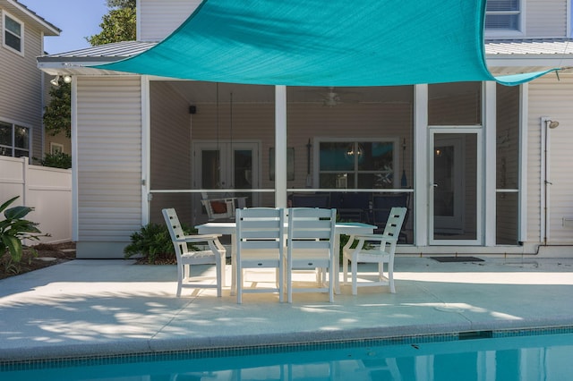 rear view of house with a patio and ceiling fan