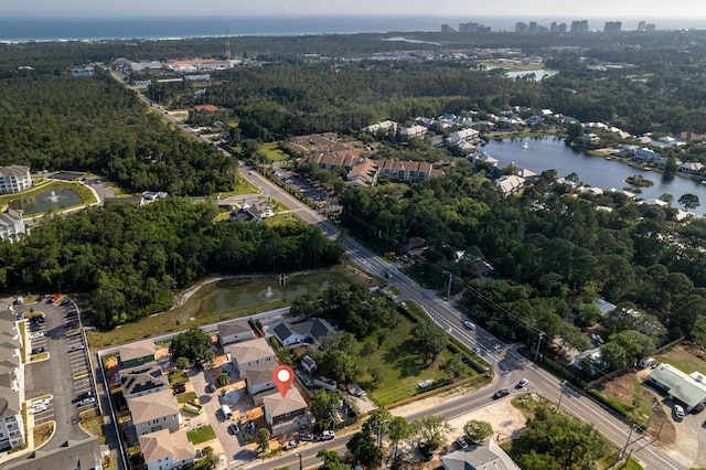 drone / aerial view with a water view