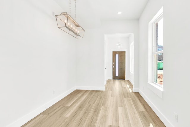 foyer featuring light wood-type flooring