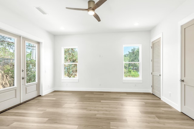 unfurnished bedroom featuring ceiling fan and light hardwood / wood-style flooring