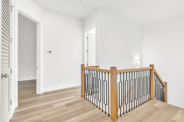 hallway featuring light hardwood / wood-style flooring