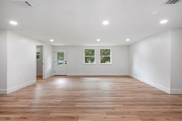 interior space with light hardwood / wood-style floors and plenty of natural light