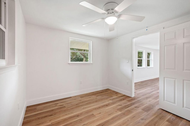 unfurnished room featuring ceiling fan and light hardwood / wood-style flooring