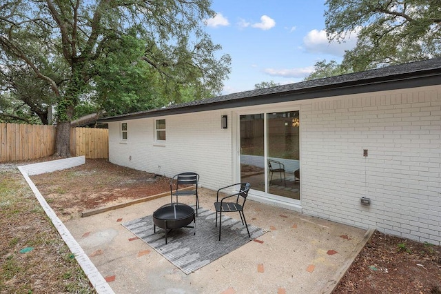 view of patio featuring a fire pit