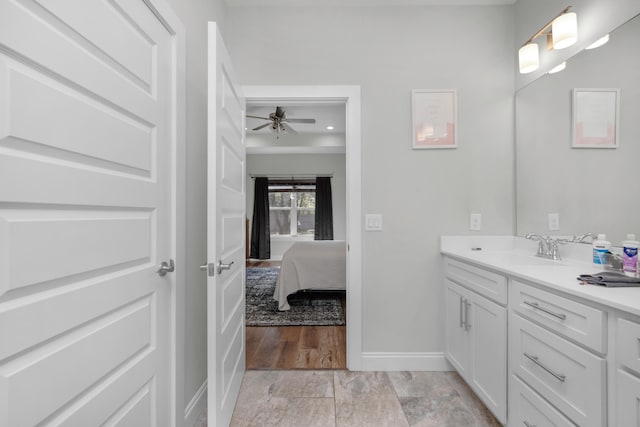 bathroom with vanity and ceiling fan