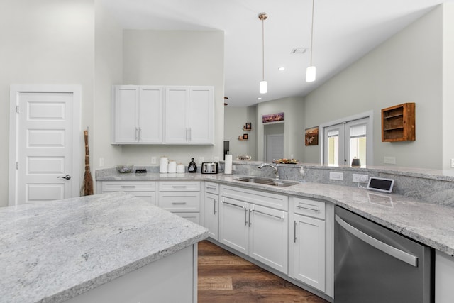 kitchen with light stone counters, stainless steel dishwasher, decorative light fixtures, white cabinets, and sink