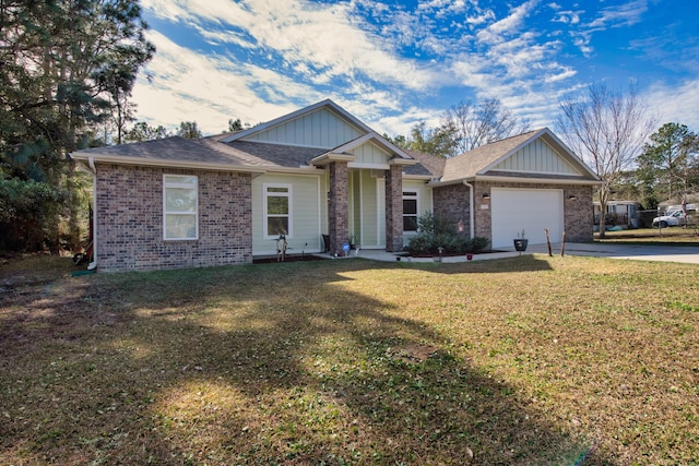 view of front of house with a front lawn and a garage