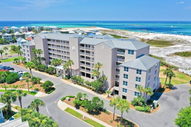 bird's eye view with a view of the beach and a water view