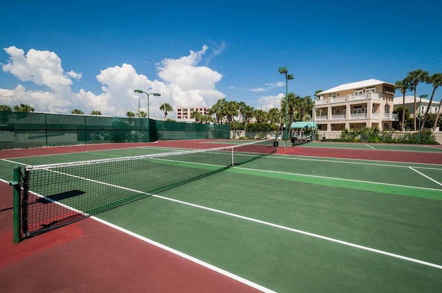 view of sport court featuring basketball hoop