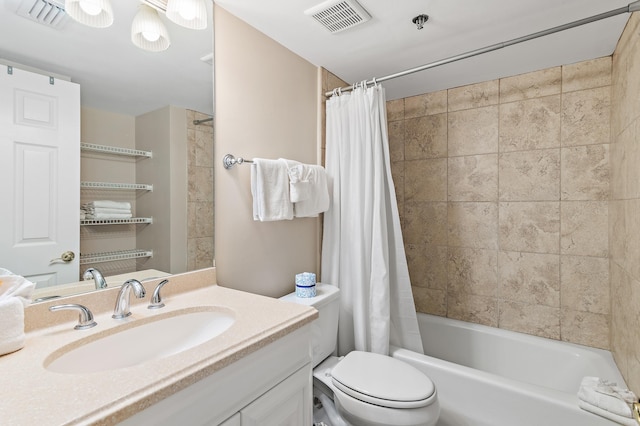 full bathroom with toilet, shower / tub combo, and vanity