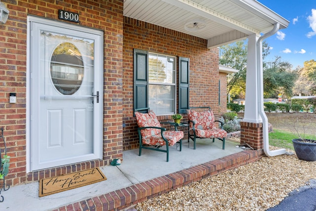 doorway to property with a porch