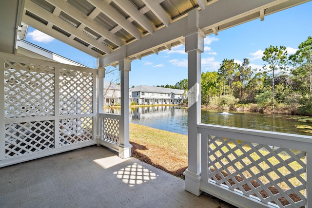 view of patio featuring a water view