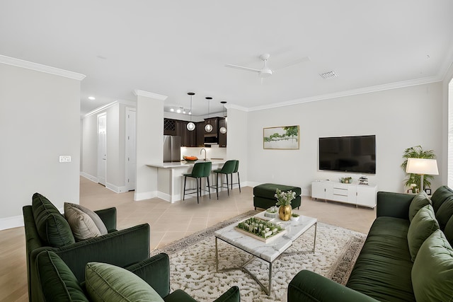 tiled living room featuring crown molding and ceiling fan