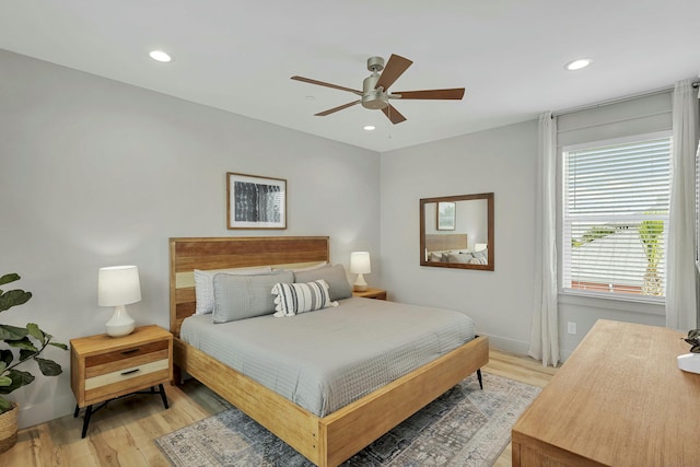 bedroom featuring ceiling fan and wood-type flooring