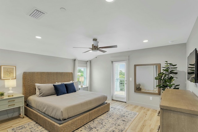 bedroom featuring ceiling fan, light wood-type flooring, and access to outside