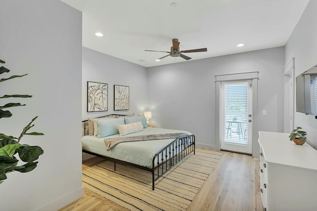 bedroom with light wood-type flooring and ceiling fan