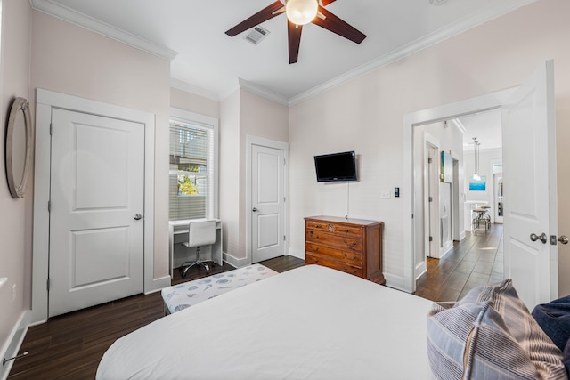 bedroom with dark hardwood / wood-style flooring, ornamental molding, and ceiling fan